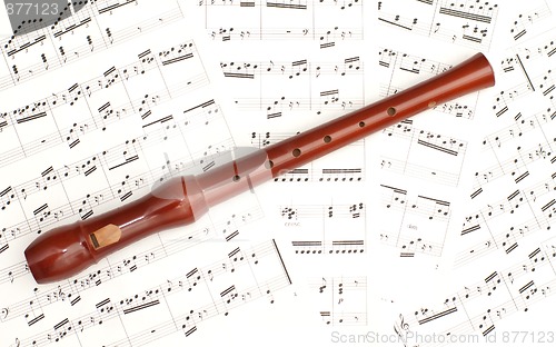 Image of Classical sheet music and flute