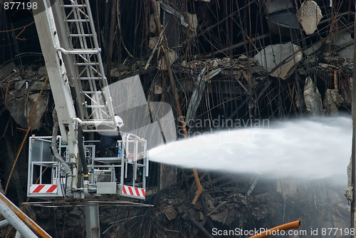 Image of Firefighter at damaged shopping mall