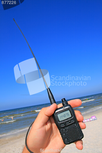 Image of Walkie talkie in a hand