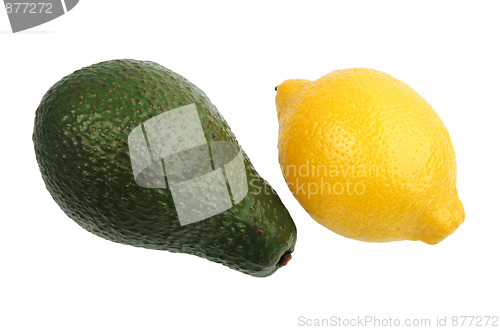 Image of Green avocado and yellow lemon.