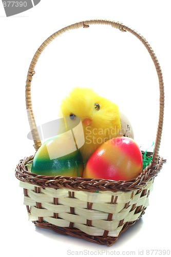 Image of Easter basket with Easter eggs and chicks