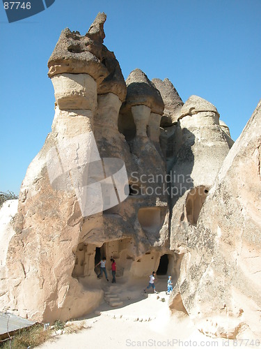 Image of Children exploring the fairy chimney houses at Cappadocia, Turkey