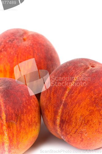 Image of three peaches