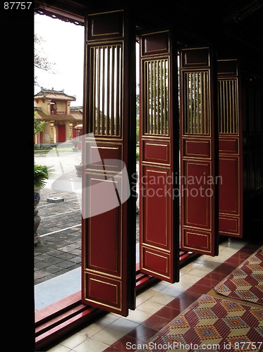 Image of Doors, with view of courtyard and gate in Forbidden Purple City, Hue, Vietnam