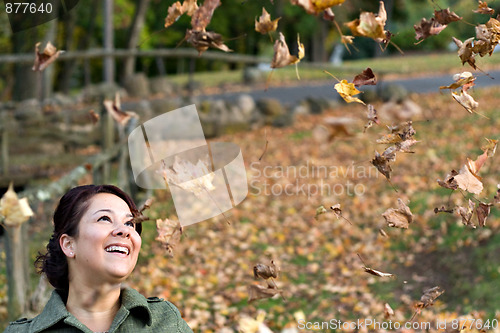Image of Falling Leaves Girl