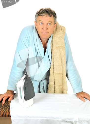 Image of Man Contemplating Ironing