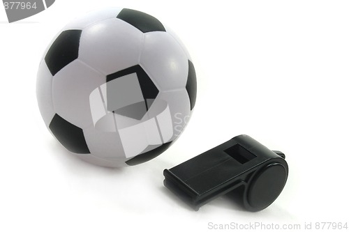 Image of Football with black whistle