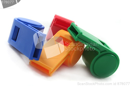 Image of four whistles