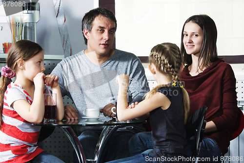 Image of Family in cafe