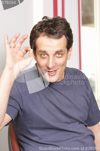 Image of Man gesturing okay