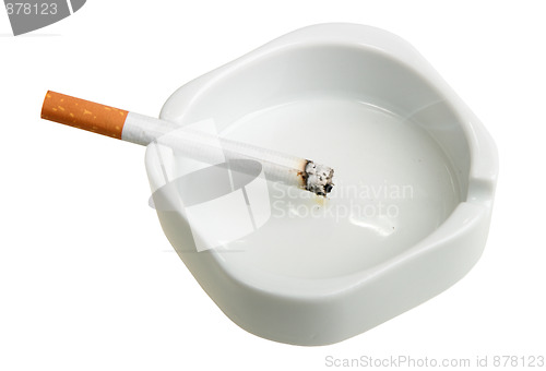 Image of White ashtray with cigarette.