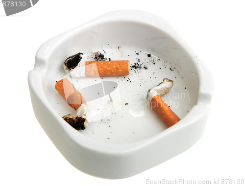 Image of White ashtray with group a smoking butts.