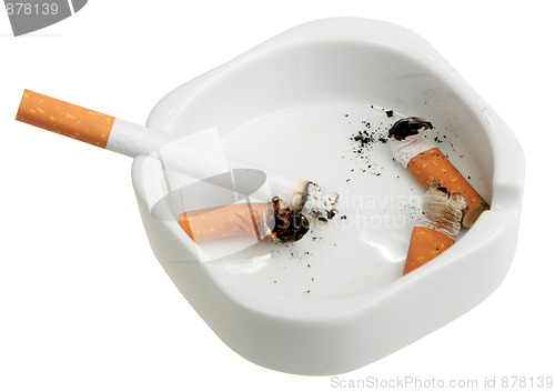 Image of White ashtray with a smoking butts and cigarette.