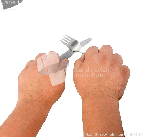 Image of Two thick hands with knife and plug