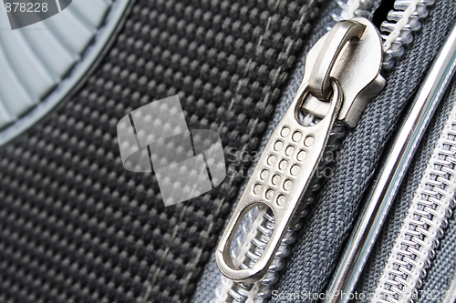 Image of A zipper on the suitcase