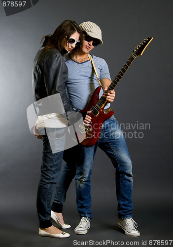 Image of playing guitar together