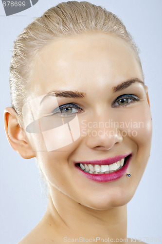 Image of woman smiling face