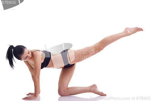 Image of woman doing physical exercise