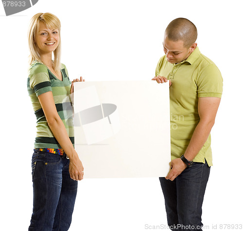 Image of couple presenting ad