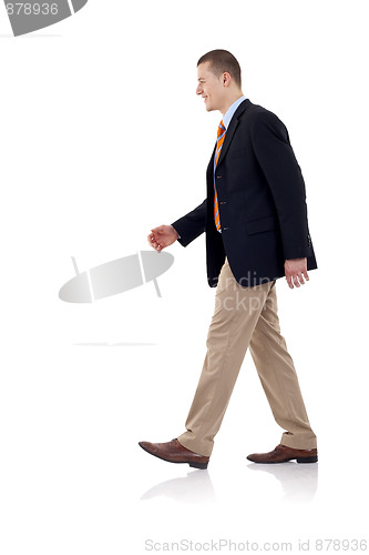Image of businessman is walking