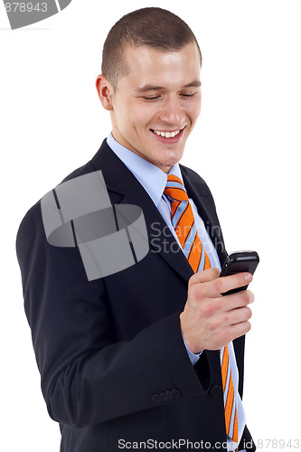 Image of businessman texting on phone
