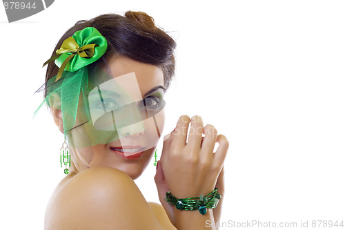 Image of woman wearing a green brooch