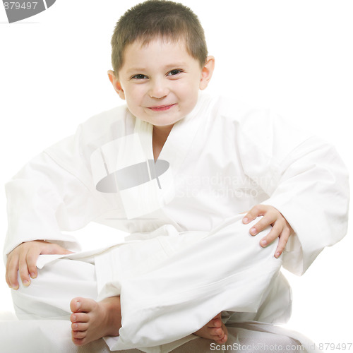 Image of Little karate kid legs crossed