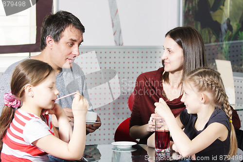 Image of Family spending time in cafe