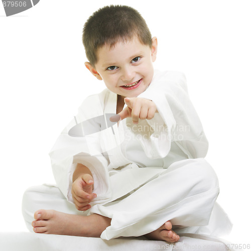 Image of Little karate kid pointing forward