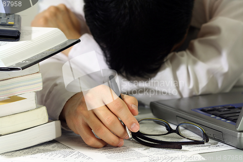 Image of Tired businessman