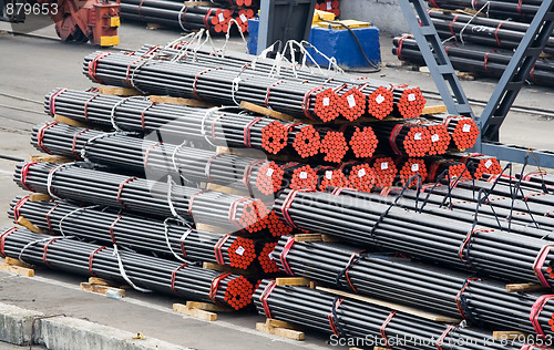 Image of Stack of metal bars prepared for loading