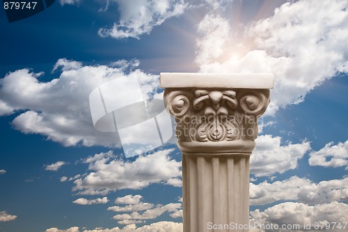 Image of Ancient Replica Column Pillar Over Clouds and Sun