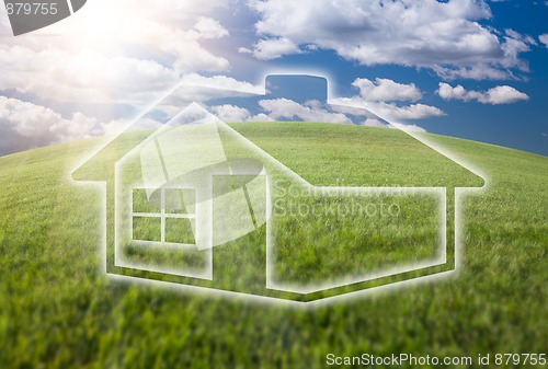 Image of Dreamy House Icon Over Grass Field and Sky
