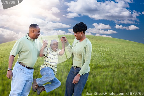 Image of Family Over Clouds, Sky and Grass Field