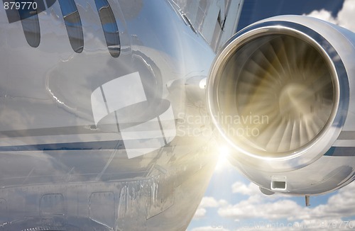 Image of Private Jet Abstract with Sunburst