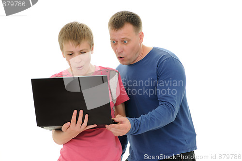 Image of  father and  son with laptop