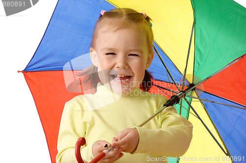 Image of Cute child with colorful umbrella