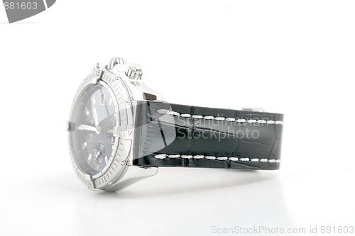 Image of luxury watch, black leather and white gold