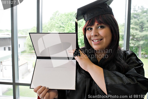 Image of Graduate with Her Diploma