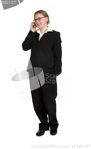 Image of young business woman on mobile phone 