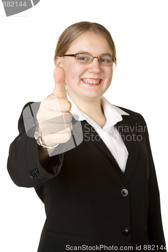 Image of young business woman with thumbs up 