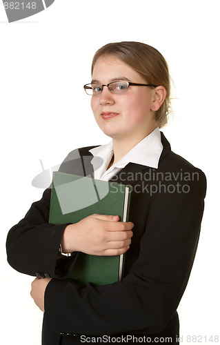 Image of young female accountant with ledger