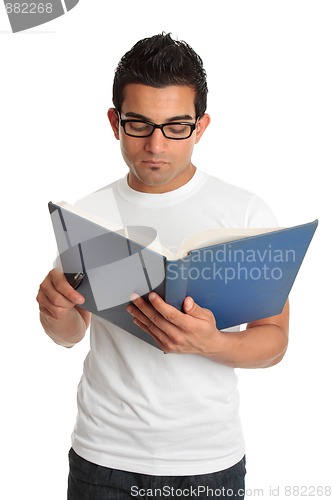 Image of Man reading a book