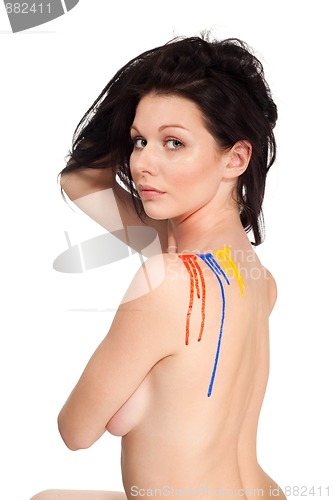 Image of Beautiful woman with color paint on her shoulder