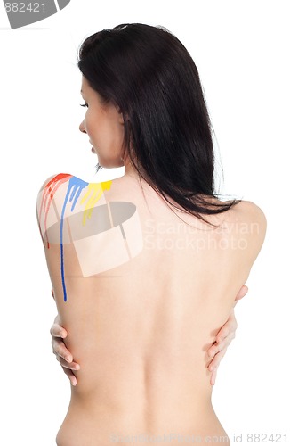 Image of Back of woman with paint