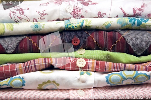 Image of stack of colored shirt