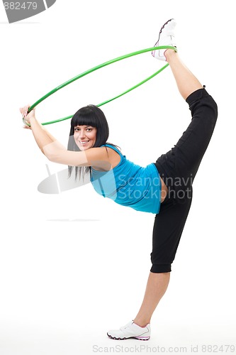 Image of Woman exercise with hoop