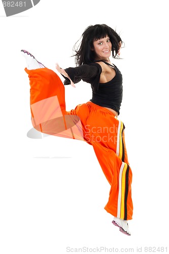 Image of Young happy woman jumping