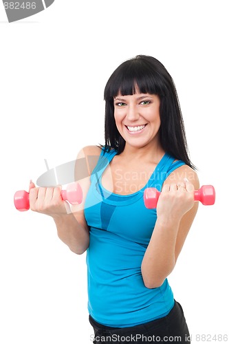 Image of Extremely happy woman with dumbbells