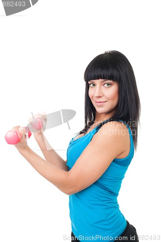 Image of Happy woman practice with pink dumbbells